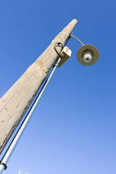 image of a lamp in the street of a rural village