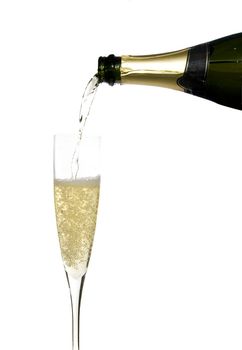 filling a glass cup with champagne wine isolated on withe background