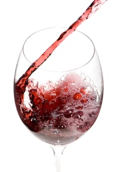 a clear glass of red wine isolated on white background