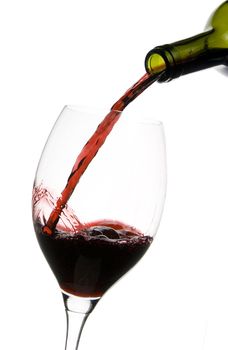 a clear glass of red wine isolated on white background