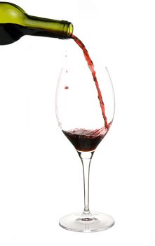 a clear glass of red wine isolated on white background