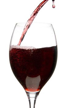 a clear glass of red wine isolated on white background