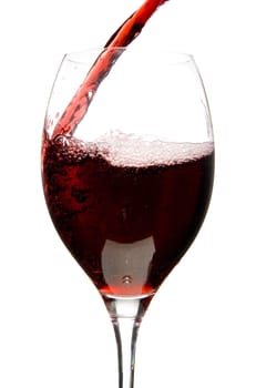 a clear glass of red wine isolated on white background