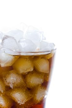 cola soft drink in a glass full of ice cubes