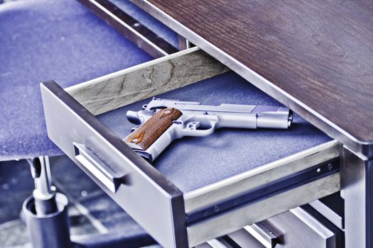 Handgun in desk drawer