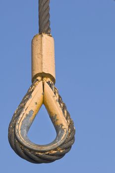 Steel cable with loop used to attach hooks in construction industry