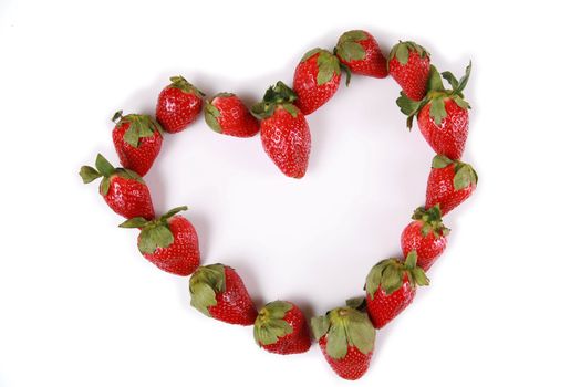 Strawberries in the shape of a heart, shallow dof