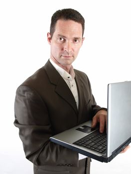 A business man makes an entry on his personal computer.