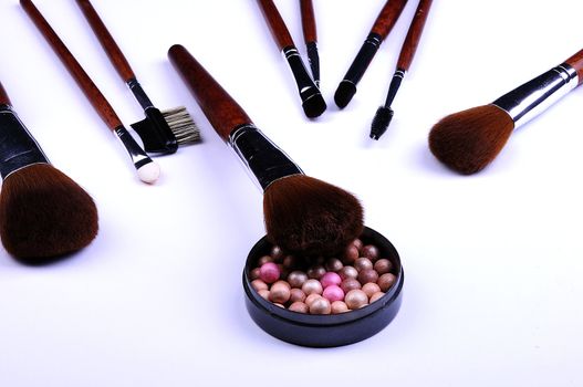 cosmetic powder and brushes