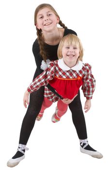 Two little acrobat girls on the white background