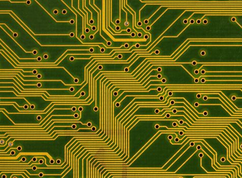 Close-up green circuit board background in hi-tech style