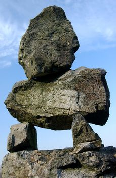 Large rocks stacked on each other in an abstract expression of art and spirituality. 


