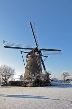 Windmill in wintertime at Kinderdijk in the Netherlands