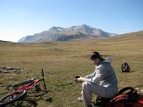 Mountains, caucasus, rocks, a relief, a landscape, the nature, a panorama, a landscape, a ridge, top, breed, the sky, reserve, a background, a kind, a bicycle, a slope, peak, beauty, bright, a file, a glacier, the girl, sports, the tourist, a grass, the Alpine meadows, tourism, travel, productive leisure, a haltt