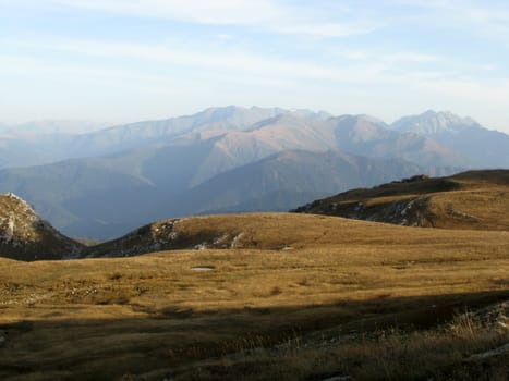 Mountains, caucasus, rocks, a relief, a landscape, the nature, a panorama, a landscape, a ridge, top, breed, the sky, reserve, a background, a kind, a route, the Alpine meadows, a glacier, snow, a slope, peak, beauty, bright, a file, a grass, tourism, travel, autumnt