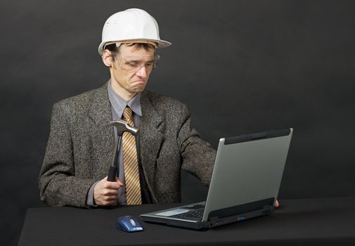 The man intends independently to repair the computer