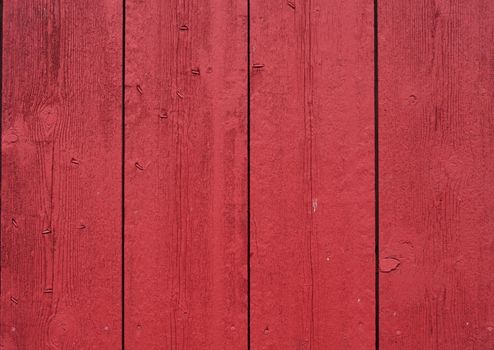 red painted barn boards make a rustic background