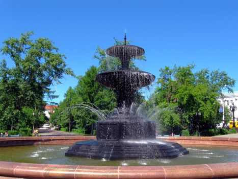 Summer.The old  Fountain in square  in Omsk, Russia