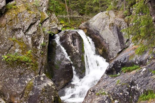 A waterfall is in the Ural mountains