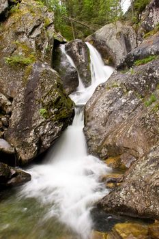 A waterfall is in the Ural mountains