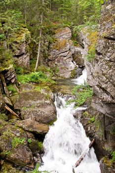 A waterfall is in the Ural mountains