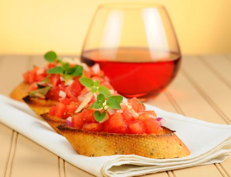 Delicious homemade bruschetta appetizer on a napkin.