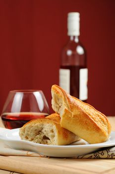 Fresh french bread served with red wine.