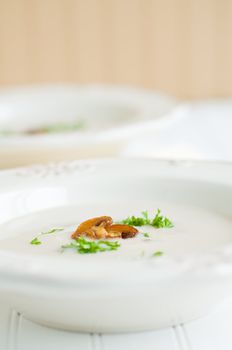 Bowl of homemade cream of mushroom soup,