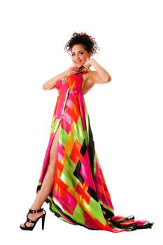 Beautiful tall Caucasian Hispanic Latina fashion model woman wearing colorful dress, standing, isolated.