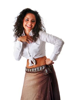 Beautiful cute Caucasian Hispanic Latina woman with curly hair, hand on hip, laughing and having fun expression, wearing white shirt and brown skirt, isolated.