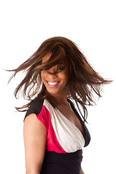 Beautiful happy smiling African American business woman in black with white and pink dress swirling and twirling her long hair while turning head, isolated.