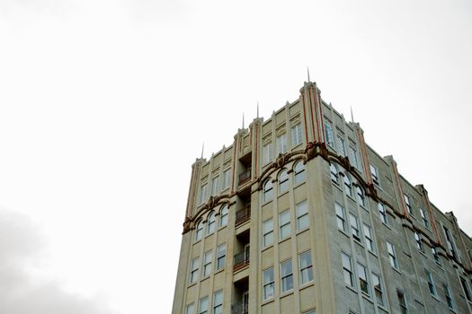 Deco building against a pale overcast sky