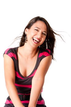 Beautiful laughing young woman with twirling brown hair having lots of fun, isolated.