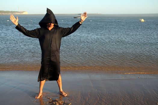 berber man standing on a beach