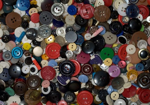 Multicolored plastic button background photographing close-up