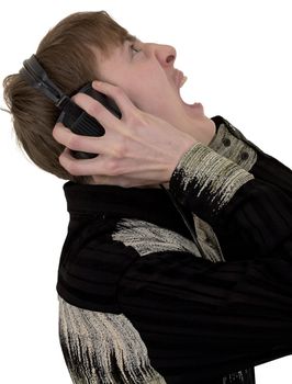 The person in ear-phones shouting at a white background