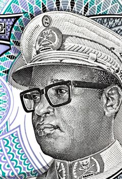 Mobutu on 5 nouveaux makuta 1993 banknote from Zaire. President of Zaire during 1965-1997. His bad management of Zaire's economy & personal enrichment from it made him synonymous with kleptocracy in Africa.