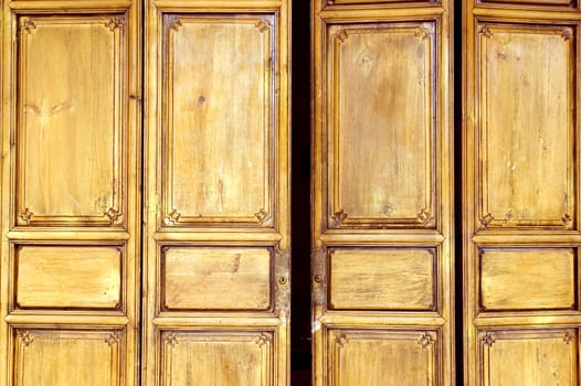 Wooden door in old style, shop entrance. China, Yunnan province, Lijiang - old town. 