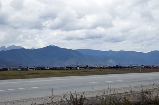 Mysterious road from Lijiang city to famous Shangrila town in Yunnan province, China. 
