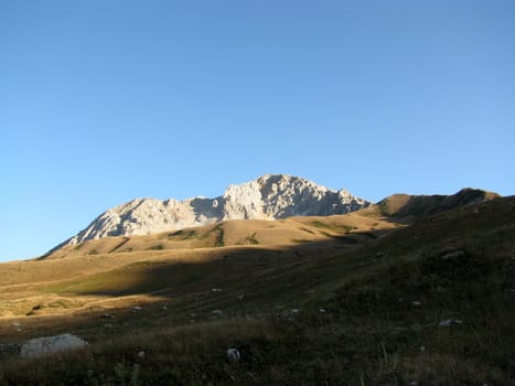 Mountains, caucasus, rocks, a relief, a landscape, the nature, a panorama, a hill, a landscape, a ridge, top, breed, the sky, reserve, a background, a kind, a route, the Alpine meadows, a slope, peak, beauty, bright, a file, a grass, tourism, travel, autumn, flora