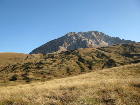 Mountains, caucasus, rocks, a relief, a landscape, the nature, a panorama, a hill, a landscape, a ridge, top, breed, the sky, reserve, a background, a kind, a route, the Alpine meadows, a slope, peak, beauty, bright, a file, a grass, tourism, travel, autumn, flora