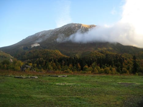 Mountains; caucasus; a relief; a landscape; the nature; a panorama; a hill; a landscape; a ridge; the sky; reserve; a background; a kind; a route; the Alpine meadows; a slope; beauty; a grass; tourism; travel; autumn; flora, clouds, wood, trees