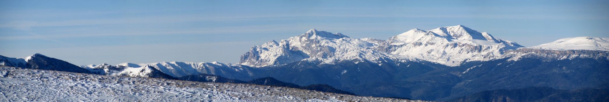 The main Caucasian ridge; rocks; a relief; a landscape; a hill; a panorama; high mountains; snow peaks