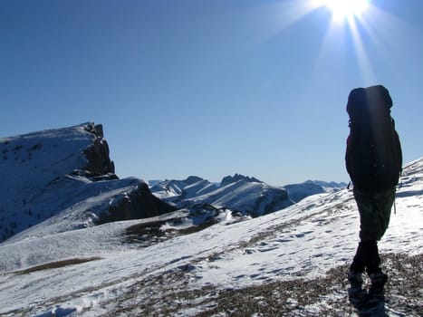 The main Caucasian ridge; rocks; a relief; a landscape; a hill; a panorama; high mountains; snow peaks