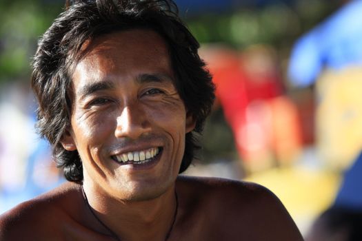 Portrait of adult Asian man smiling. Bali. Indonesia