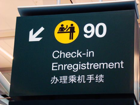 Check in sign at international airport.