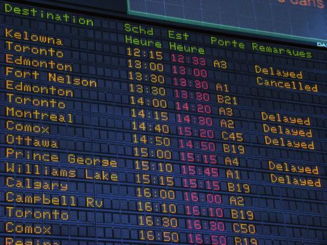 Canadian airport information board, domestic departures.