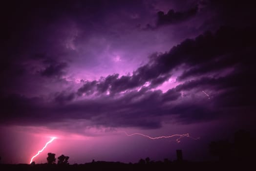 Lightning strikes the ground during a summer thunderstorm near Rockford, Illinois.