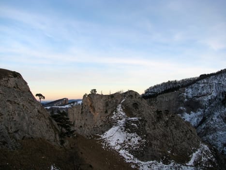 The main Caucasian ridge; rocks; a relief; a landscape; a hill; a panorama; high mountains; snow peaks