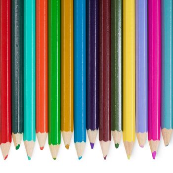 Fourteen children's color pencils on a white background